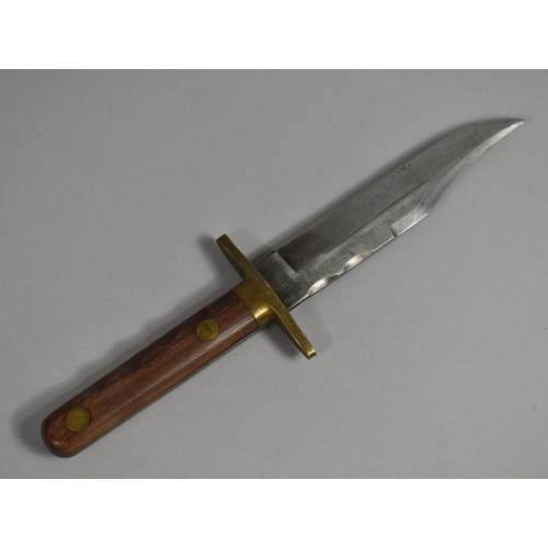 91 - A Vintage Bowie Knife by William Rodgers, Brass Guard and Wooden Scales, Leather Sheath