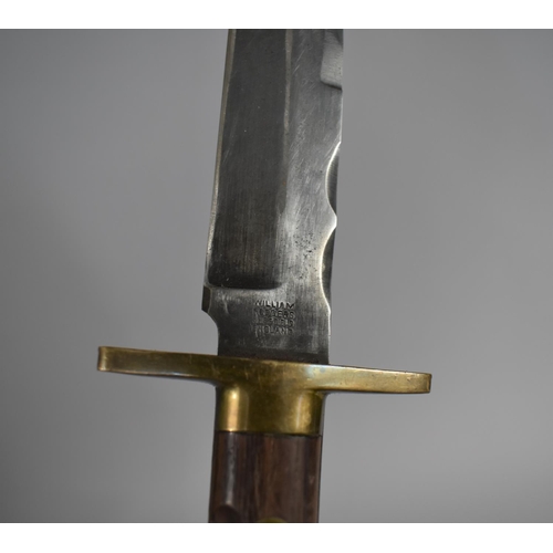 91 - A Vintage Bowie Knife by William Rodgers, Brass Guard and Wooden Scales, Leather Sheath