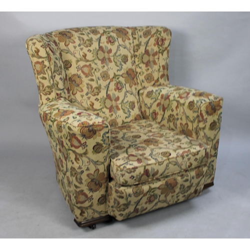 496 - A Modern Tapestry Upholstered Armchair