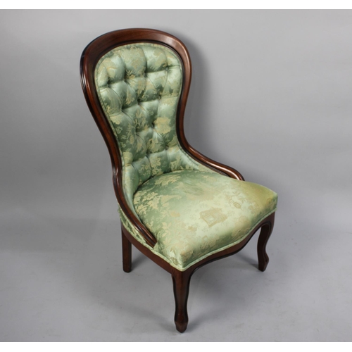 498 - A Reproduction Button Upholstered Serpentine Front Balloon Back Nursing Chair