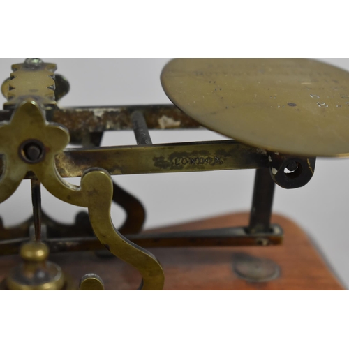 65 - A Late Victorian Brass Postage Scale on Serpentine Shaped Plinth Base with Set of Graduated Weights,... 