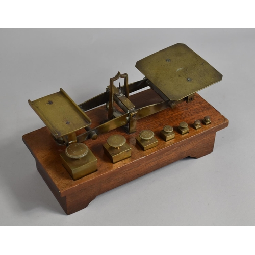 70 - A Late Victorian Set of Brass Postage Scales with Graduated Weights Set on Mahogany Plinth Base, 25x... 