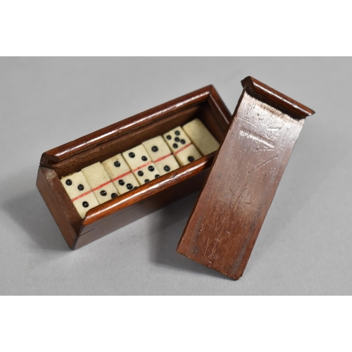 75 - A Miniature Cased Set of Bone Dominoes, 5.5cms Wide