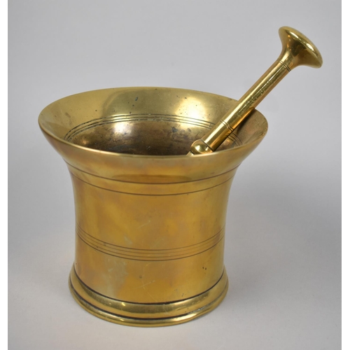 28 - A Large Heavy Bronze Pestle and Mortar, 19th Century, 15cms Diameter and 12cms High