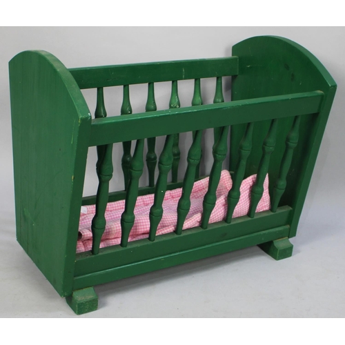 516 - A Vintage Green Painted Dolls Cradle, 59cm wide