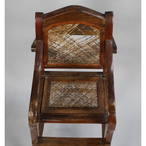 524 - An Edwardian Cane Seated and Back Child's High Chair