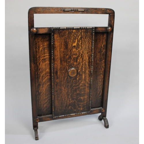 77 - An Art Deco Oak Fire Screen, 50cms Wide