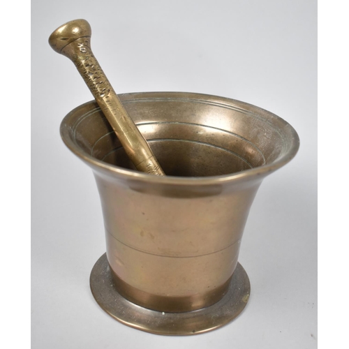 83 - A 19th Century Bronze Pestle and Mortar, 14cms Diameter