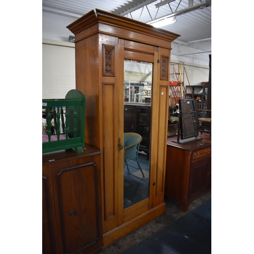 515 - An Art Nouveau Satinwood Mirror Fronted Single Wardrobe, 103cm wide