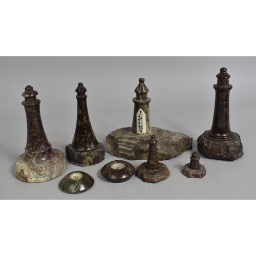 121 - A Collection of Six Serpentine Marble Lighthouses and Two Serpentine Marble Compasses