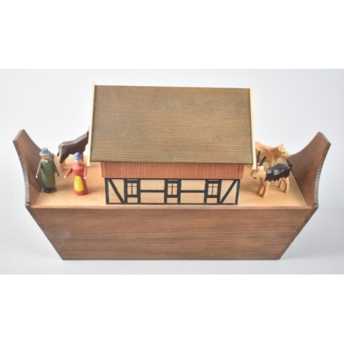 21 - A Modern Carved Wooden Noah's Ark Toy with Figures and Animals, 25cms Wide