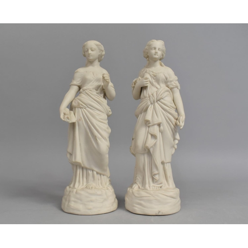 38 - A Pair of Continental Bisque Figures of Maidens, 24cms High