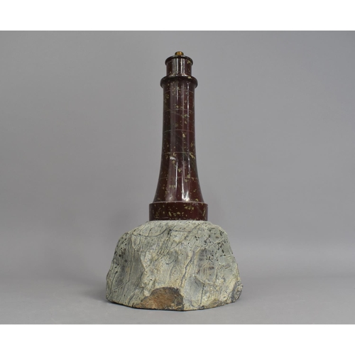 39 - A Novelty Table Lamp Base in the Form of a Serpentine Marble Lighthouse Set on Rock Plinth, 35cms Hi... 