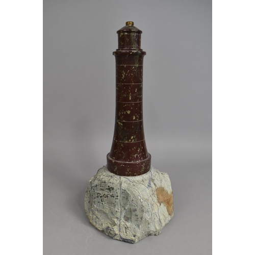 39 - A Novelty Table Lamp Base in the Form of a Serpentine Marble Lighthouse Set on Rock Plinth, 35cms Hi... 