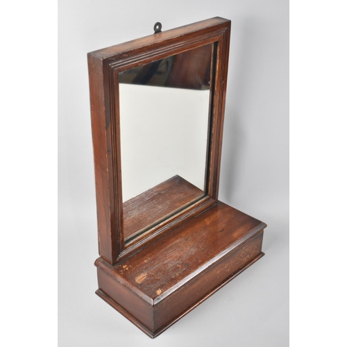 106 - An Edwardian Wall Hanging Hall Mirror with Glove Box, 29cms Wide and 47cms High