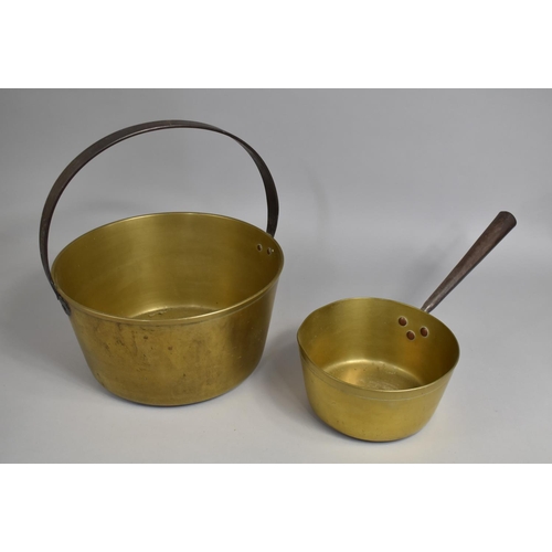 113 - A Large Brass Jam Kettle, 31cms Diameter, Together with a Brass Saucepan with Iron Handle, 21cms Dia... 