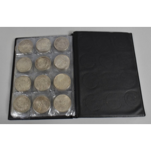 247 - An Album Containing Large Quantity of What Appear to Be Replica Silver Coins