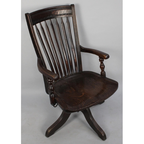 469 - An Edwardian Oak Swivel Office Chair