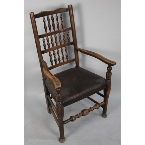 478 - A Late 19th Century Spindle Back Armchair