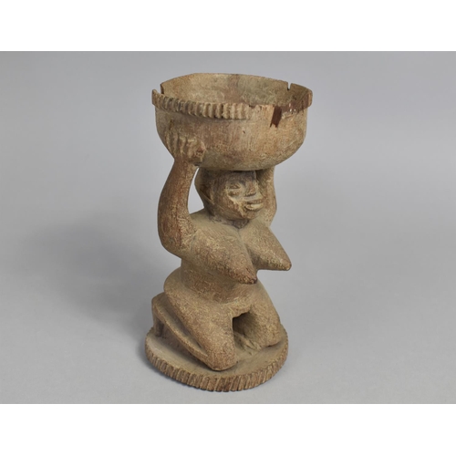 99 - A Mid 20th Century African Carved Wooden Tribal Souvenir in the Form of Kneeling Maiden Holding Bowl... 