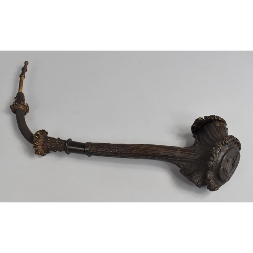 128 - A Black Forest Carved Antler Pipe, Hinged Lid with Stag and Hind, Base with Deer Behind Tree, 50cms ... 