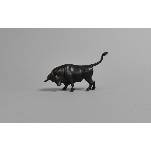 13 - A Small Patinated Bronze Study of a Fighting Bull, 9cms Long