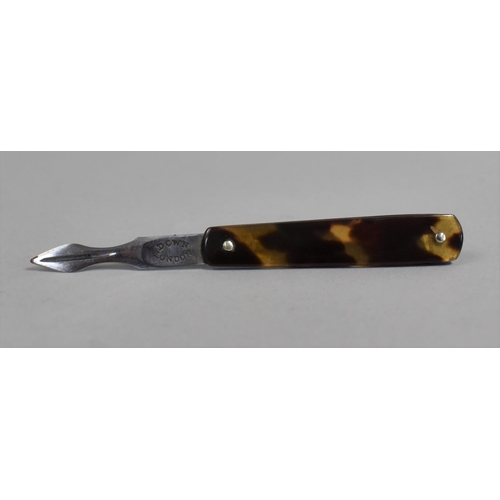 140 - A 19th Century Tortoiseshell Flip Fleam by Down of London, 6cm Long