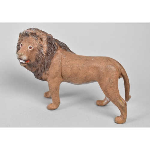 15 - A Cold Painted Bronze Study of a Lion, 10cms Long