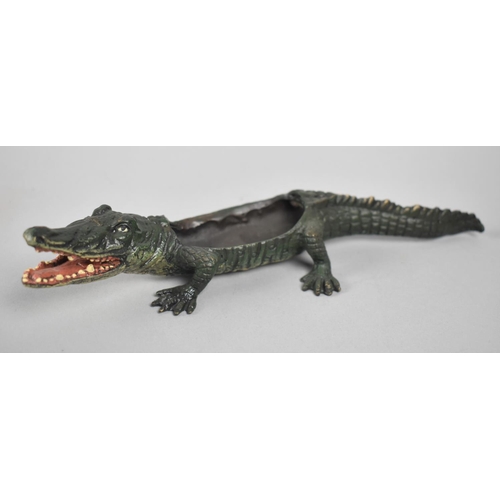 17 - A Reproduction Cold Painted Bronze Novelty Match Holder in the Form of a Crocodile, 22cms Long