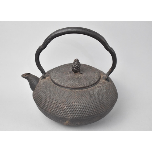 18 - A Heavy Circular Cast Iron Oriental Teapot with Seal mark under Spout, 17cms Diameter