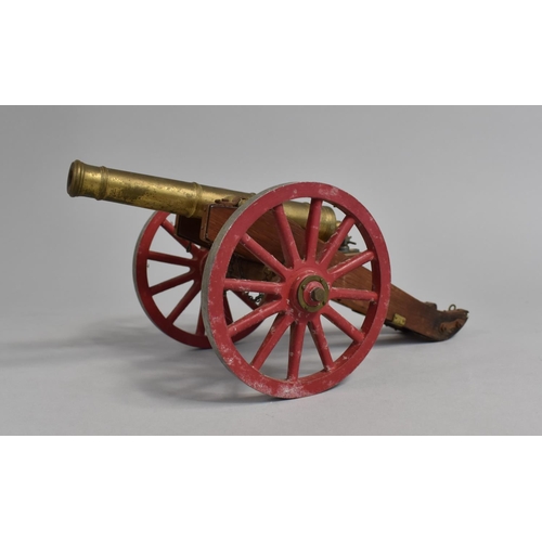 23 - A Mid 20th Century Nicely Detailed Model of a Field Cannon, Brass Barrel, Metal Wheels, 29cms Long