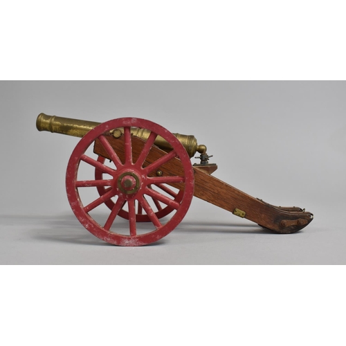 23 - A Mid 20th Century Nicely Detailed Model of a Field Cannon, Brass Barrel, Metal Wheels, 29cms Long