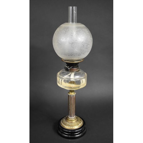 26 - A Late Victorian Oil Lamp with Ribbed Brass Column Support, Plain Glass Reservoir, Etched Globe Shad... 