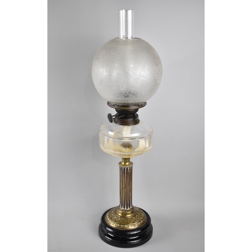 26 - A Late Victorian Oil Lamp with Ribbed Brass Column Support, Plain Glass Reservoir, Etched Globe Shad... 