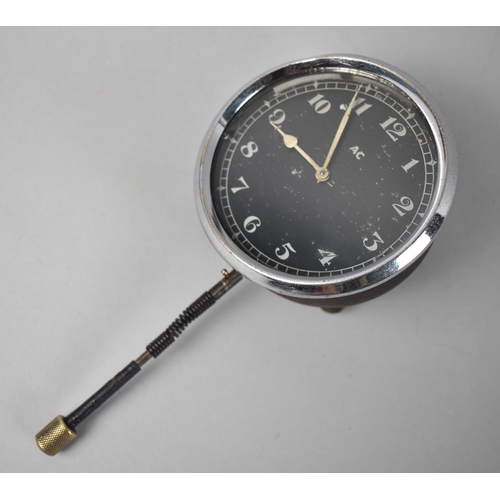 54 - A Vintage Car Clock with Black Dial Inscribed AC and Wind Up Clockwork Movement