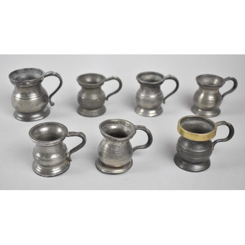 86 - A Collection of Seven Various Small Pewter Measures, Tallest 6cms High