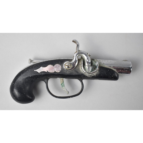 88 - A Mid 20th Century Chrome and Wood Cigarette Lighter in the Form of a Percussion Cap Pistol, 14cms L... 