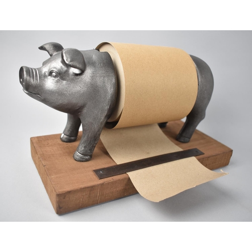 99 - A Modern Novelty Paper Dispenser in the Form of a Pig on Rectangular Wooden Plinth, 26cms Wide