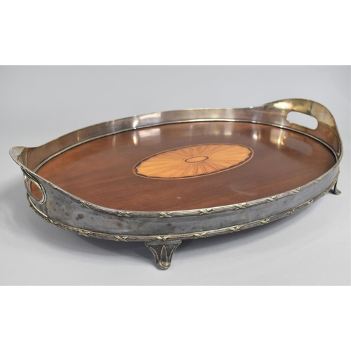 157 - A 19th Century Inlaid Mahogany Oval Tray with Silver Plated Gallery, 55cms Wide, Four Scrolled Feet