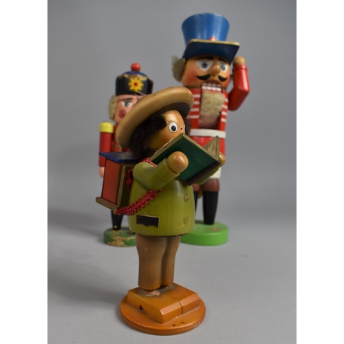 167 - A Collection of Three Painted Continental Wooden Figures, Two Soldier Nutcrackers and Musical Choris... 