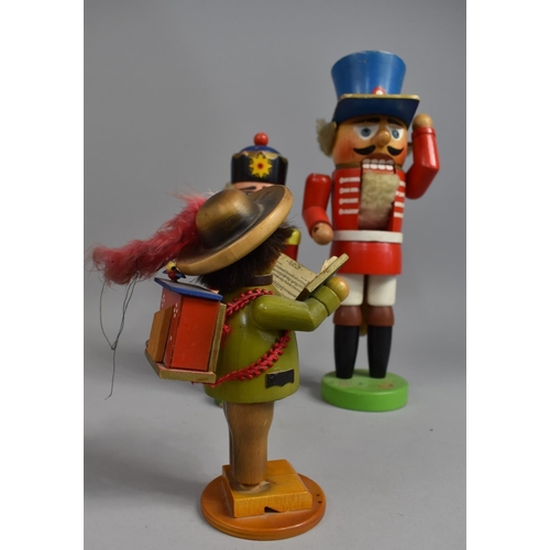 167 - A Collection of Three Painted Continental Wooden Figures, Two Soldier Nutcrackers and Musical Choris... 