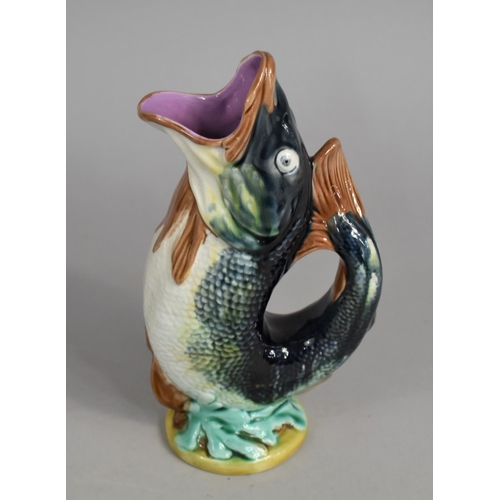 351 - A Majolica Glazed Gluggle Jug, 23.5cm high, with Hairline to Lip