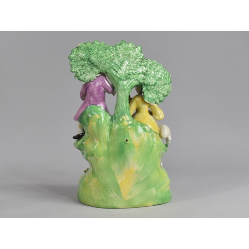 361 - A 19th Century Staffordshire Study of Lovers in Briar with Sheep and Musical Instruments, 22cm high