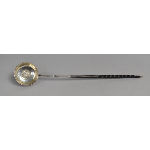 384 - A Georgian Silver Toddy Ladle with Twisted Baleen Handle