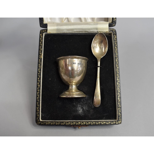 389 - A Cased Silver Egg Cup and Spoon Set, 36g