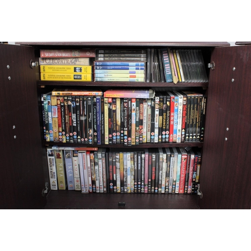 429 - A Large Collection of DVDs and CDs inside 2 Modern Mahogany Stands