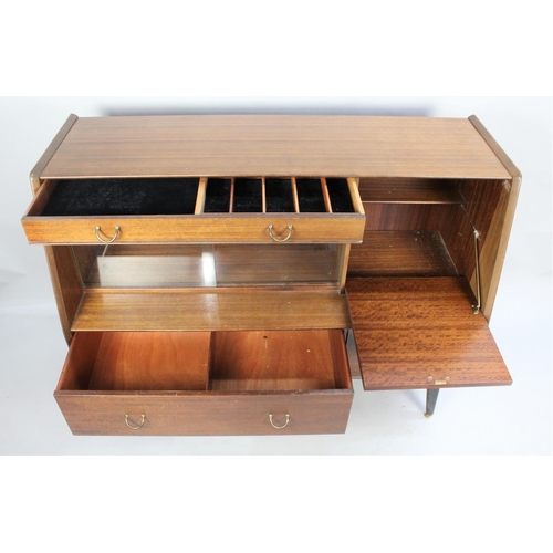 445 - A 1960s Sideboard with Long Cutlery Drawer over Glazed Display, Fall Front Cocktail/Bottle Cabinet a... 