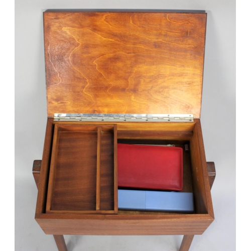 455 - A Mod 20th Century Lift Top Sewing Box in Teak, 47cms Wide