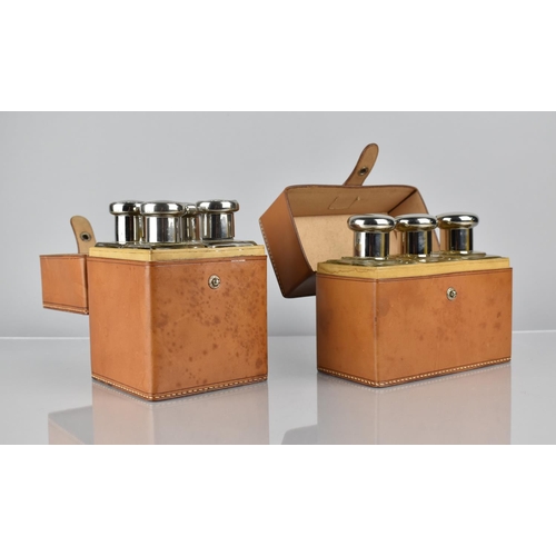 59 - Two Well Made Leather Cased Sets of Glass Flasks, All with Plated Tops and Inner Glass Stoppers, One... 