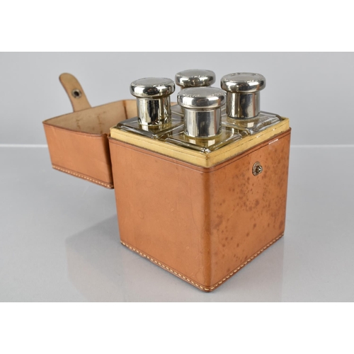 59 - Two Well Made Leather Cased Sets of Glass Flasks, All with Plated Tops and Inner Glass Stoppers, One... 